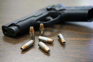 A gun and bullets