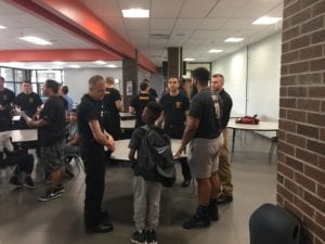 Lunch with the Law brought together law enforcement cadets with young men of color.