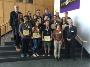 Some of the 2018 winners of the Frank Paul Medal of Excellence, with SUNY Broome President Kevin Drumm and Professors Robert Lofthouse and Diana LaBelle.