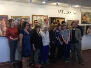 The Tanzer family and the Steigenwalds pose for a photo at the opening of the Michael Tanzer exhibit in the Gallery