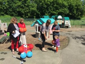 Left to right: American Heart Association Regional Director Gina Chapman, Professor Carla Michalak, BC Center Director Pam Holland and Deena Price at the donation of outdoor play equipment to the campus childcare center