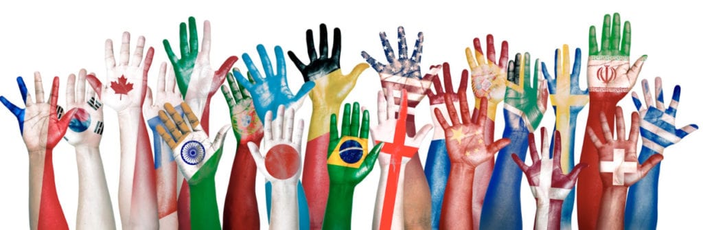 Hands with international flag designs on them