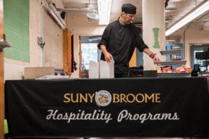 Allen Conti prepares for the Hospitality Club's weekly soup sale