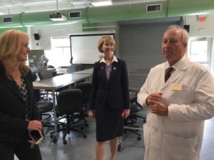 Chemistry Professor Harold Trimm, SUNY Chancellor Kristina Johnson and Dean of STEM Michele Snyder in the Calice Center's food science labs on Oct. 17, 2018.