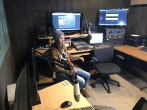 Student Kylie Gage in the Hive radio station