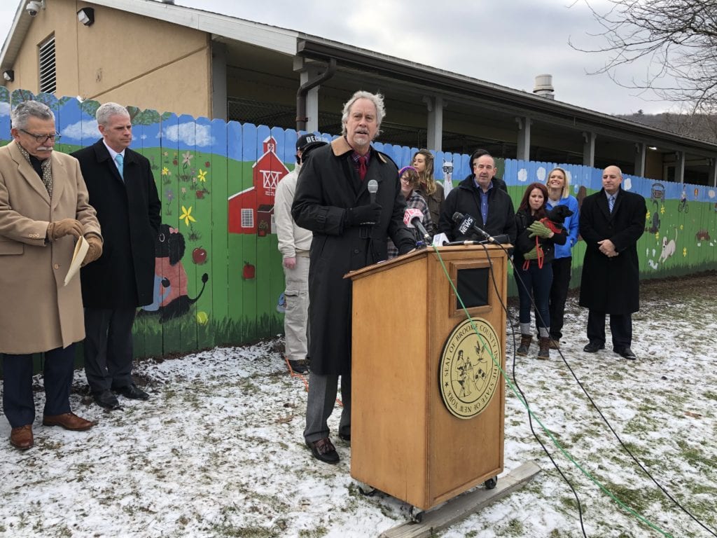 SUNY Broome President Kevin E. Drumm speaks during a press conference at the Broome County Dog Shelter.