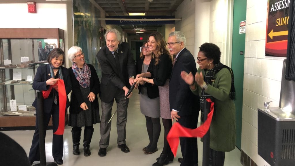 The ribbon is cut outside the Career Closet on Feb. 21, 2019