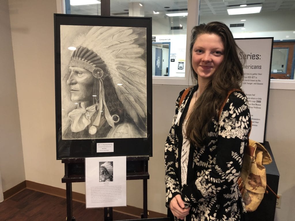 Anya Karlgut and her completed drawing