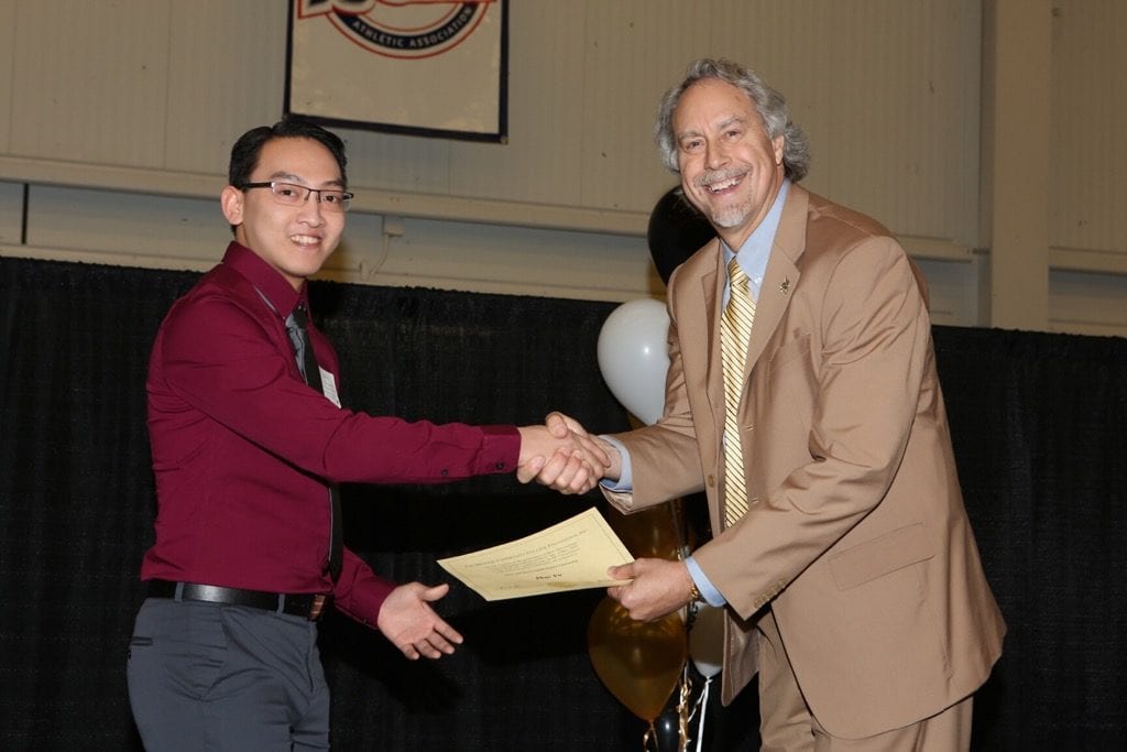 Phuc Vo and SUNY Broome President Kevin E. Drumm during the annual scholarship night