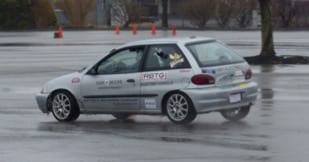 Student Michael DiGiacomo pilots the car through the autocross portion of the event