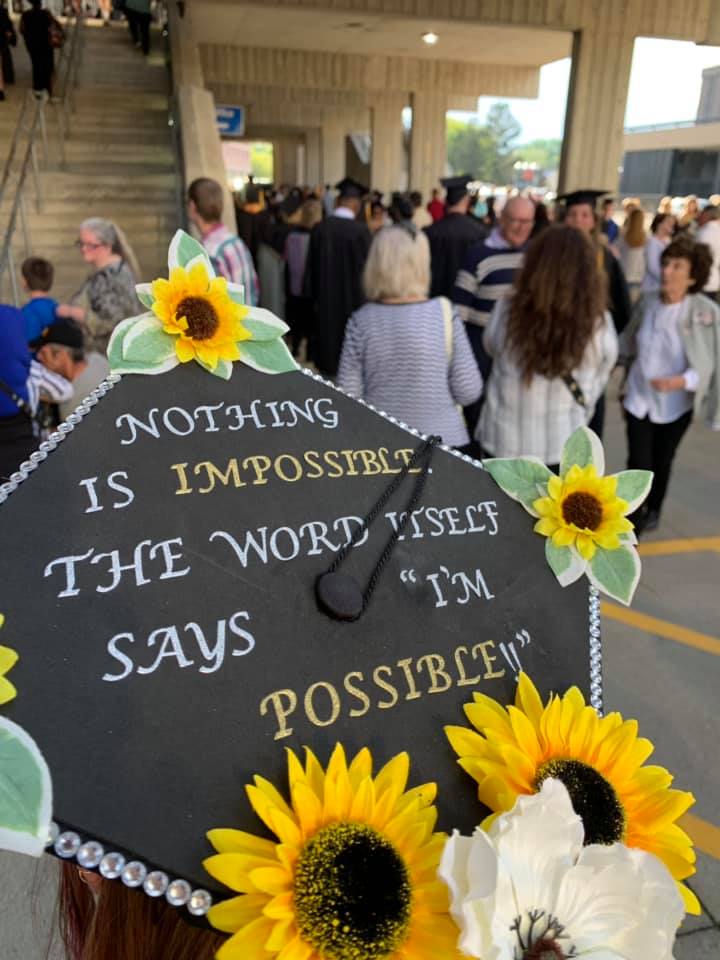 Kendra Papocchia, a health sciences major from Susquehanna, Pa., displays an inspirational message on her cap at the SUNY Broome graduation.