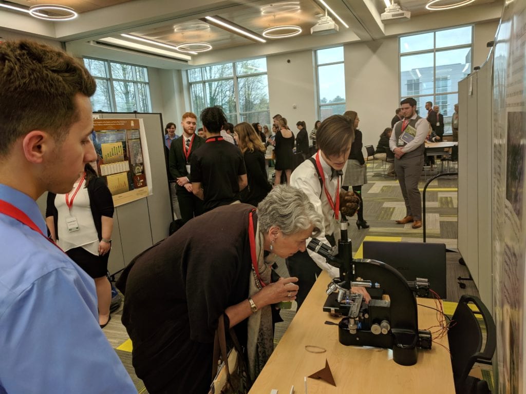 Nick Hayko and Tyler Mucci explain their research into 3-D printed material at SURC.