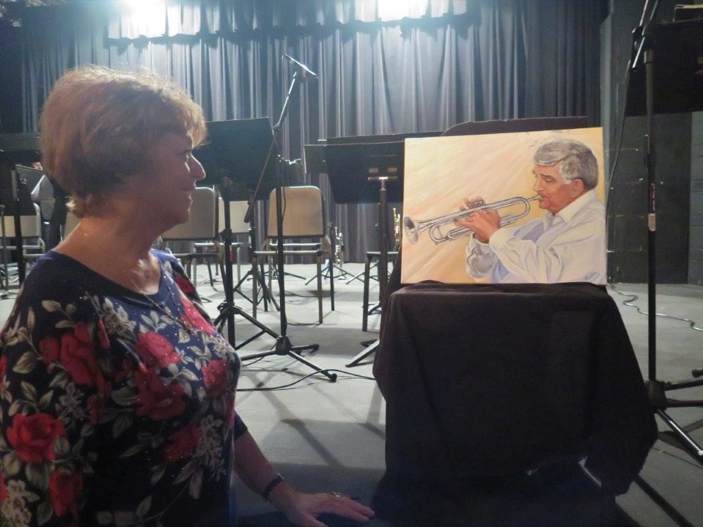 Barbara Olevano and the portrait of her husband Armand