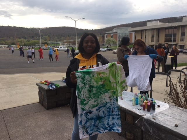 The tie-dye station at the Student Village block party