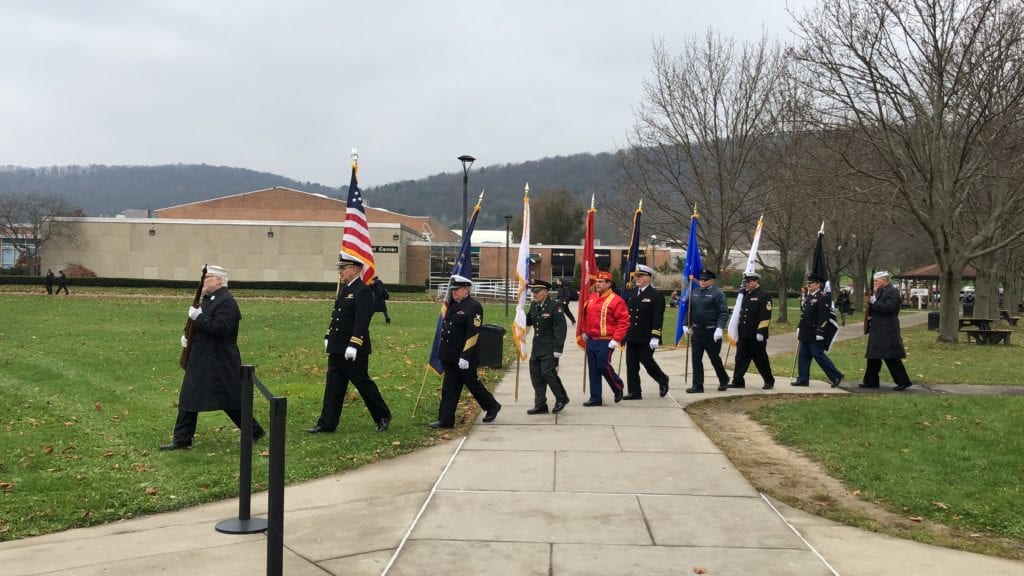 The Broome County Veterans Memorial Association Color Guard processes during Veterans Day 2019