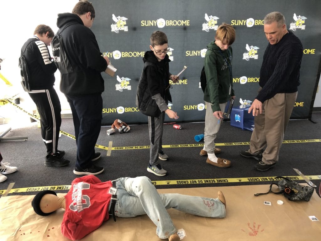 Students investigate a virtual crime scene at SPARK on Jan. 22, 2020