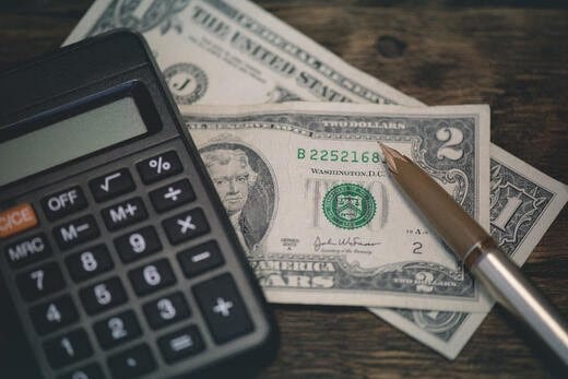 Finance: calculator and dollars
