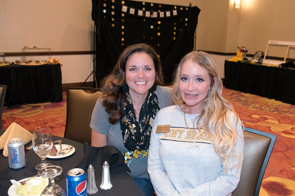 Lisa Schappert and Amber Johnson, of the Office of Alumni Affairs and BCC Foundation, at an alumni event.