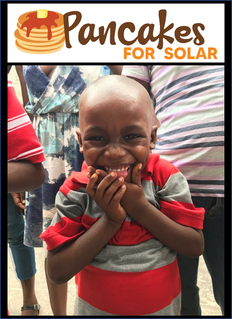 Pancakes for Solar: Thank You. Happy young boy smiling at the camera.