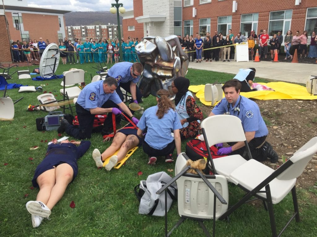 Paramedic students coordinate treatment during the 2018 Mock Environmental Disaster.