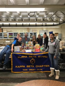 Members of Alpha Beta Gamma, the Business Honor Society, raised funds and donations for the Food for Thought food pantry on campus.