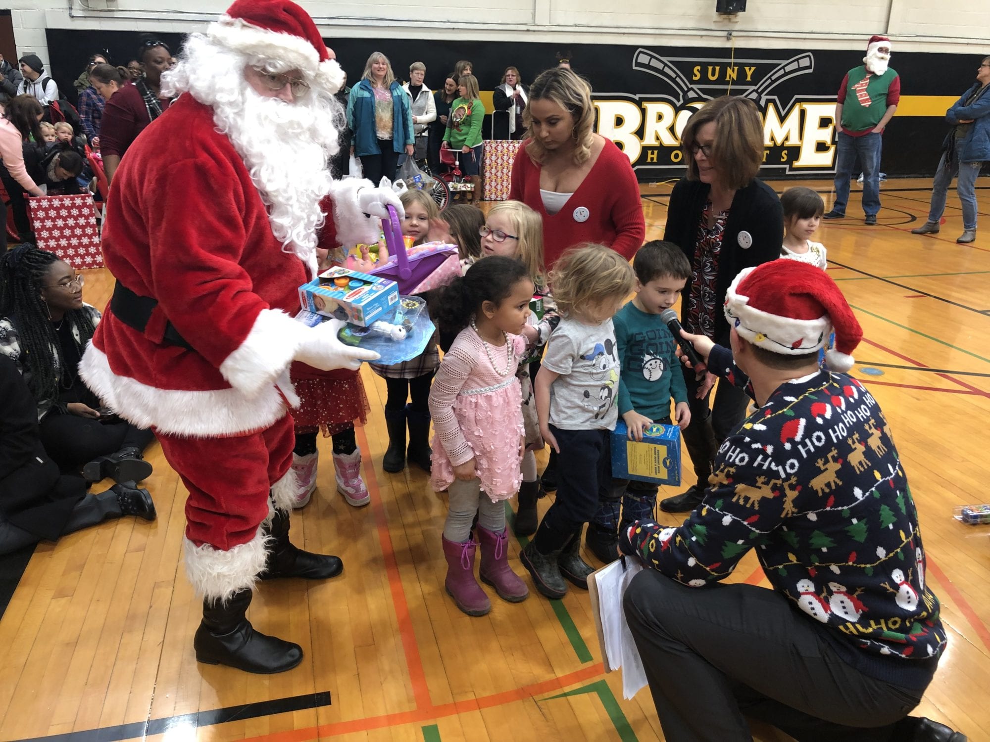 Santa’s helpers: SUNY Broome turns out for the Giving of the Toys