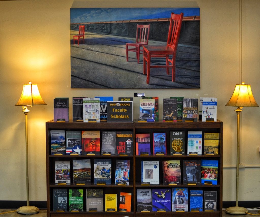 The new library display that showcases work by SUNY Broome faculty