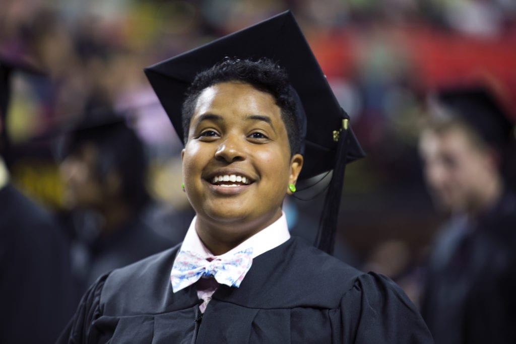 A graduate during Commencement 2018