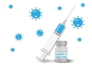 Covid-19 Vaccine and syringe