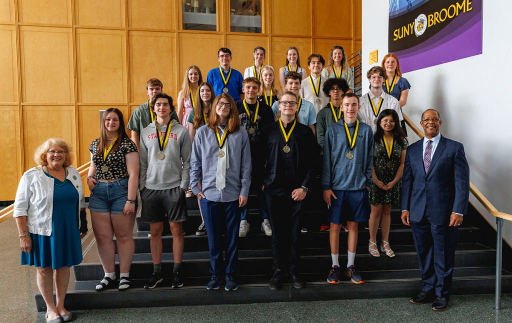 SUNY Broome recognizes Frank G. Paul Medal of Excellence in Math and Science recipients. Students, Rebecca Komorowski (RN ‘76), and Dr Hawkins.