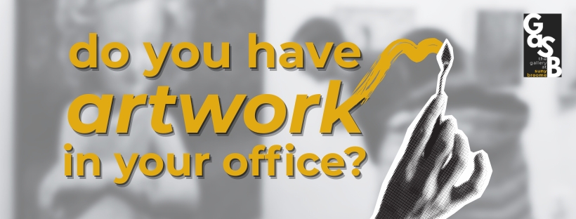 A gray, blurred banner with a graphic of a hand painting on yellow text that reads "do you have artwork in your office?"